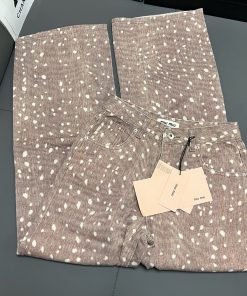 - 新款牛仔裤早春新品MIU梅花
